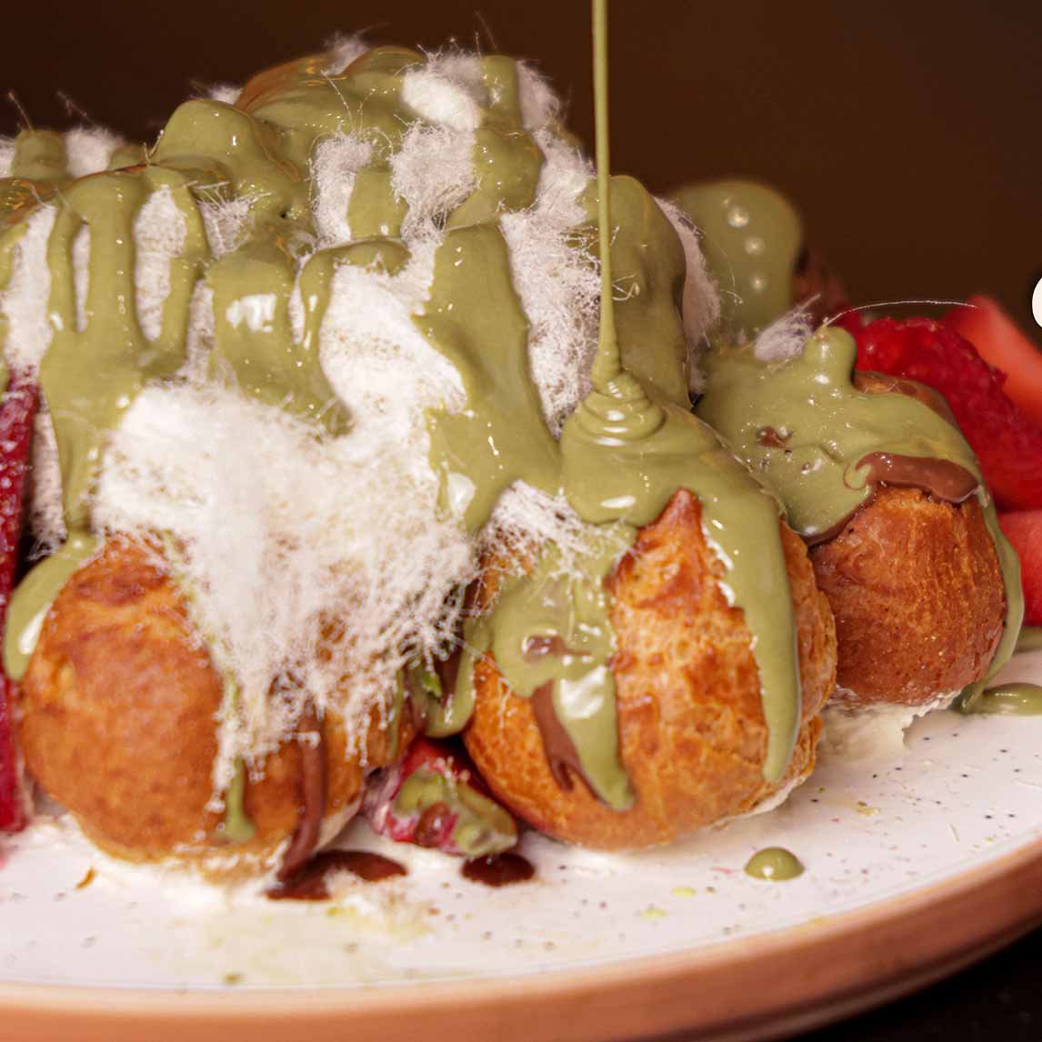 Pistachio Ghalzleh Cream Puffs